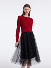a lady in a pure wool patchwork sequins tulle midi dress with red cardigan
